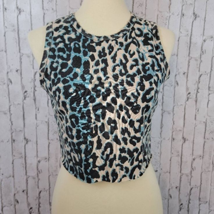 Dance & Marvel Sleeveless Top Animal Print With Cream, Black, And Blue Size Small New With Tag Distressed Trim, Raw Hem Crop Top Measurements Width: 17.5" Length: 16" Materials: 55% Cotton 45% Linen Machine Wash Cold Style: At0526 Blue Sleeveless Blouse Crop Top, Stretch Sleeveless Leopard Print Top, Casual Leopard Print Sleeveless Tank Top, Casual Sleeveless Leopard Print Top, Blue Cropped Vest For Summer, Fitted Leopard Print Sleeveless Crop Top, Fitted Sleeveless Leopard Print Crop Top, Summer Stretch Leopard Print Tops, Stretch Leopard Print Tops For Summer