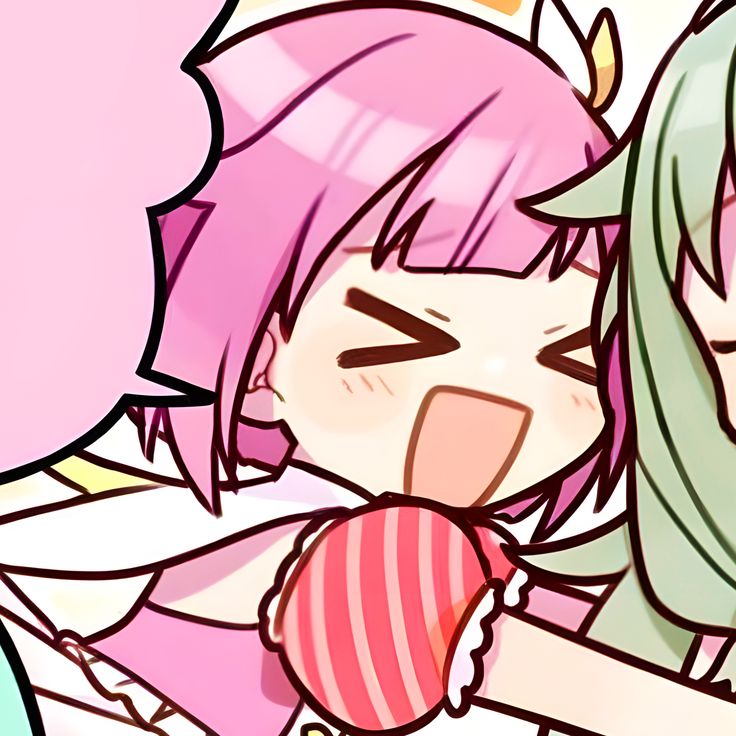 two anime characters hugging each other with their mouths open and one holding a heart shaped lollipop