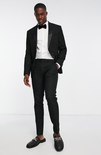 A skinny fit enhances the contemporary appeal of this tuxedo jacket classically detailed with contrast lapels. 29" length (size 42R) Notched lapels Lined 64% polyester, 34% viscose, 2% elastane Dry clean Imported Party People, Tuxedo Jacket, Tie And Pocket Square, Free Fabric, Pocket Square, Nordstrom, Black