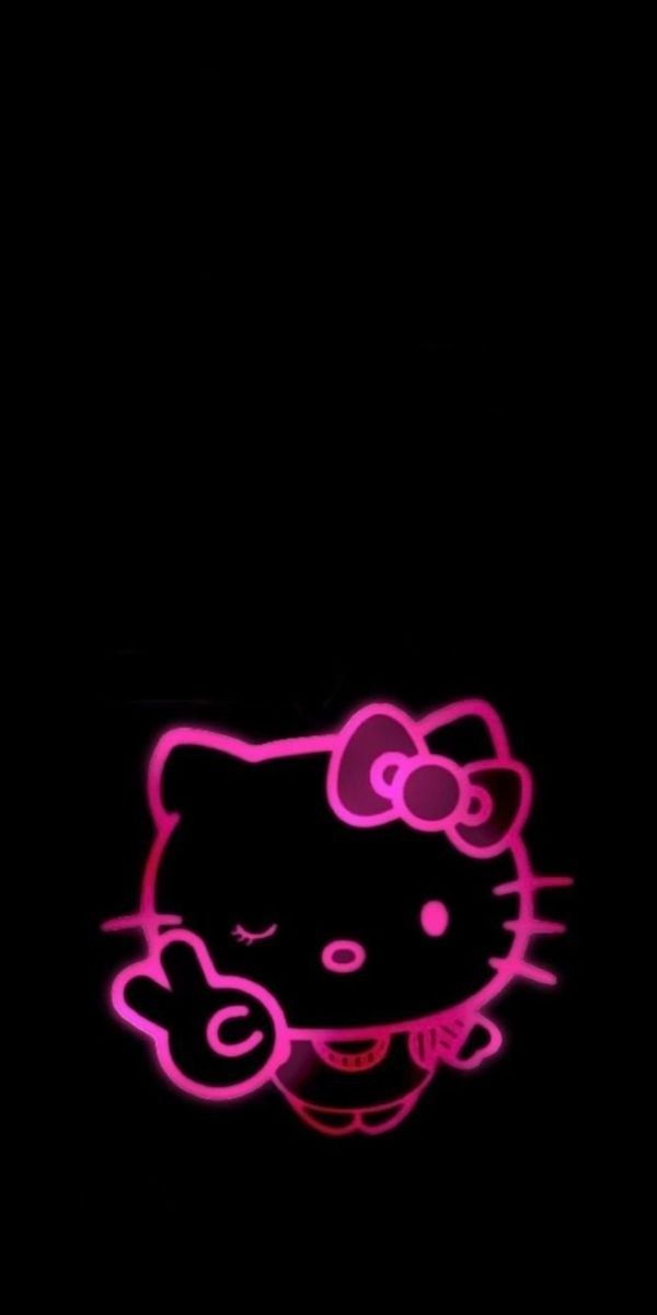 the hello kitty wallpaper is lit up with pink light and has a black background