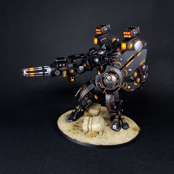 Black and Orange T'au Painting Process Warhammer 40k Miniatures Tau, T’au Warhammer 40k, Warhammer 40k Tau Paint Schemes, Tau Empire Colour Scheme, Community Painting, Tau Battlesuit, Warhammer Tau, Tau 40k, Infinity Miniatures