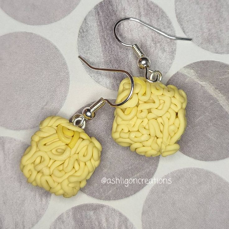 Ramen Earrings Noodles measure approximately between 1.5cm to 2.25cm Materials: ▫ Polymer Clay ▫ Hypoallergenic Hanging Earring Hook Each Ramen square is handmade by me, so you may receive a pair of earrings that are slightly different from the ones pictured in the listing. As they are all made by hand all are similar but no two pairs will ever be the same! I can also do custom orders. Please feel free to send me a message with any questions or ideas! Thanks for checking out my shop! Square Hypoallergenic Earrings For Gift, Hypoallergenic Square Earrings For Gifting, Hypoallergenic Square Earrings As Gift, Hypoallergenic Square Earrings For Gifts, Gift Square Pendant Earrings For Pierced Ears, Gift Earrings With Square Pendant For Pierced Ears, Square Pendant Earrings For Gift, Handmade Square Earrings For Gift, Handmade Yellow Rectangular Earrings