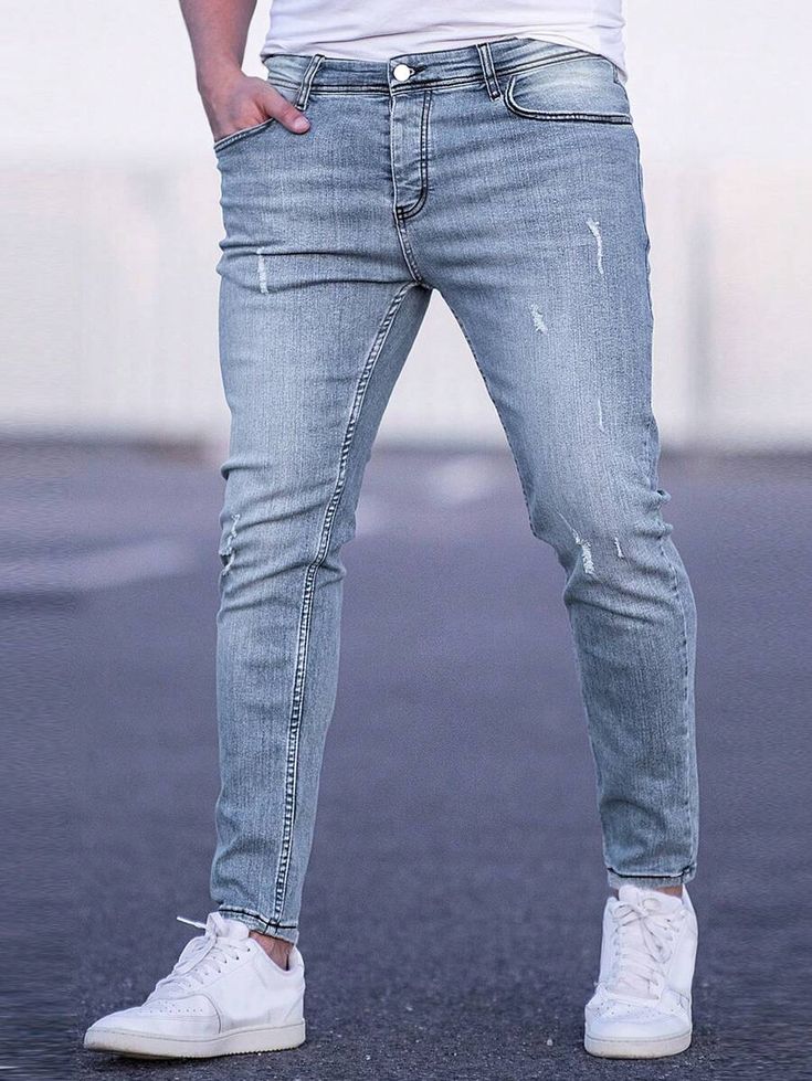 Details:Pocket \nDetails:Ripped \nClosure Type:Zipper Fly \nDetails:Washed \nColor:Light Wash \nPattern Type:Plain \nType:Skinny \nWaist Line:Natural \nLength:Long \nFit Type:Skinny \nFabric:Medium Stretch \nMaterial:Denim \nComposition:54% Cotton \nComposition:36% Polyester \nComposition:9% Viscose \nComposition:1% Elastane \nCare Instructions:Machine wash, do not dry clean \nBody:Unlined \nSheer:No \n Cat Scratch, Drawstring Waist Shorts, Letter Print Hoodie, Lined Hoodie, Velvet Shirt, Printed Polo Shirts, Jeans Online, Drawstring Hoodie, Clothing Size Chart