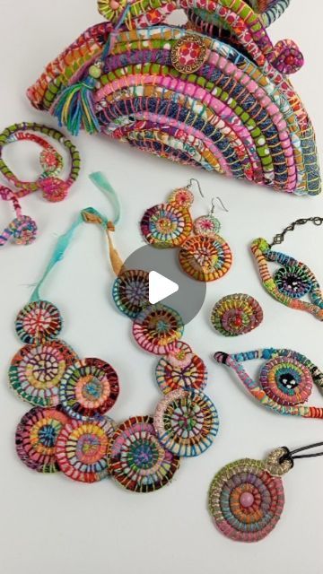 an assortment of beaded jewelry is displayed on a white surface with the video title below it