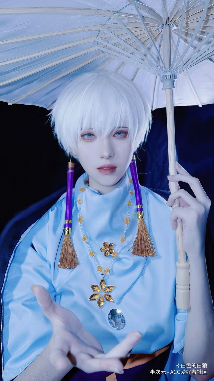 a woman with white hair holding an umbrella