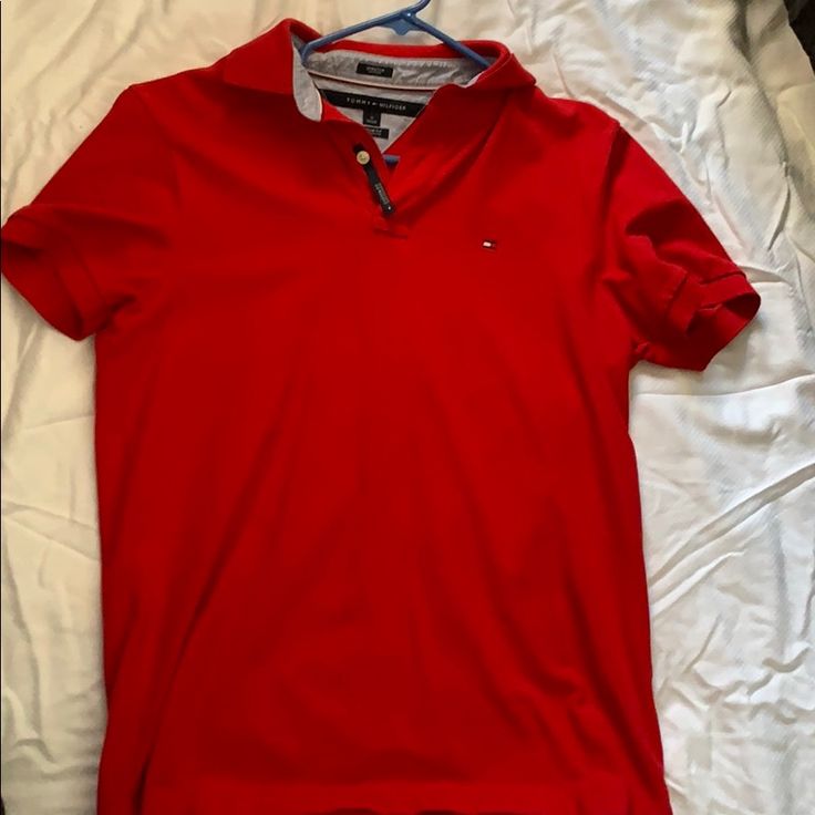 Red Tommy Hilfiger Polo, Never Worn Red Polo Collar Shirt For Summer, Red Cotton Polo Shirt For Spring, Classic Red Tops For Spring, Classic Red Spring Top, Fitted Tommy Hilfiger Polo Collar Top, Classic Red Polo Collar Top, Red Fitted Short Sleeve Polo Shirt, Classic Tommy Hilfiger Cotton Polo Shirt, Casual Red Short Sleeve Polo Shirt