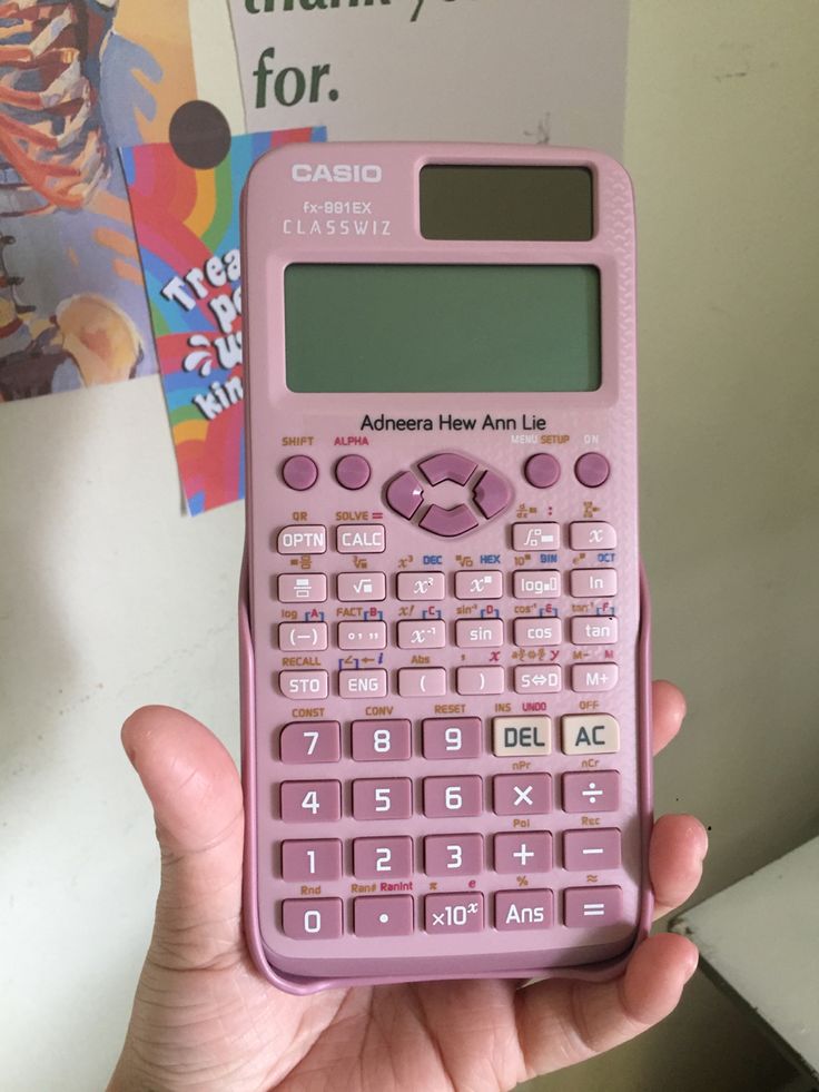 a pink calculator in someones hand