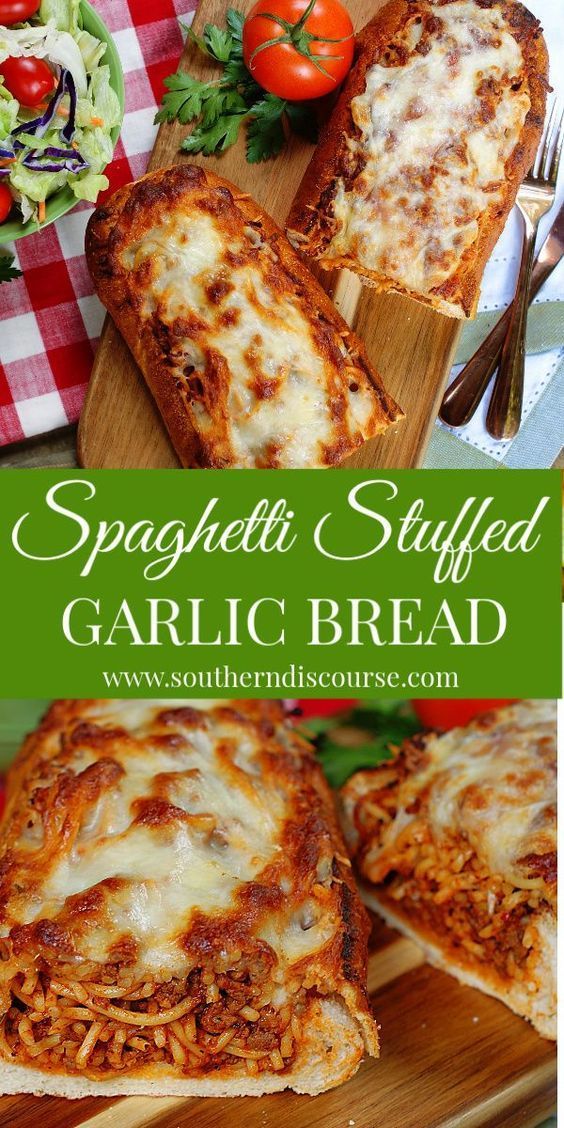 spaghetti stuffed garlic bread is shown on a cutting board