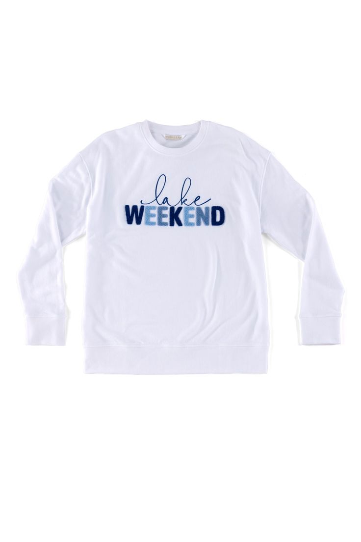 Creatures of comfort, rejoice! Shiraleah's "Lake Weekend" Sweatshirt joins our popular line of phrase-driven apparel items. Made from a lightweight cotton blend, this breathable piece is perfect for lounging at home or by the lakefront. Featuring soft multicolored toothbrush embroidery, this sweatshirt is perfect for the lake lover in your life. Pair with other items from Shiraleah to complete your look! Features a neutral white color with the words "lake weekend" embroidered with letters in dif Fall Cotton Tops For Relaxation, Cotton Tops For Relaxation In Fall, Comfortable Cotton Sweatshirt For Relaxation, White Organic Cotton Sweatshirt For Loungewear, Casual Crew Neck Sweatshirt, Casual White Tops For Weekend, Crew Neck Cotton Sweatshirt For Relaxation, Cotton Crew Neck Sweatshirt For Relaxation, Casual Cotton Sweatshirt For Relaxation