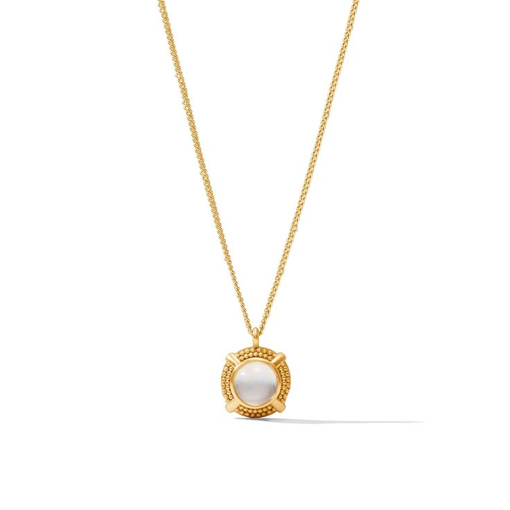 A polished round gemstone in a golden beaded setting with an X motif dangles from a delicate curb chain. Timeless Gold Cabochon Jewelry, Classic Cabochon Round Pendant Jewelry, Timeless Gold Jewelry With Cabochon, Classic Round Cabochon Pendant Jewelry, Classic Round Pendant Cabochon Jewelry, Elegant Jewelry With Adjustable Chain And Round Stone, Elegant Medallion Jewelry With Box Chain, Elegant Medallion Necklace With Pearl Chain, Timeless Gold Necklace With Round Stone