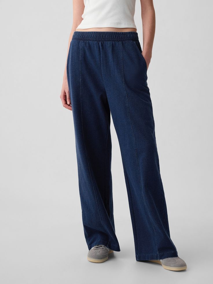 Soft cotton sweatpants.  Elasticized waist.  Front slant pockets.  Seam at front and back.  * Fit: Classic.  An easy silhouette that fits close  at the waist, and is relaxed through the hips and thigh.  Mid rise.  Models wearing Gap Denim Sweatpants, Easy Silhouette, Cotton Sweatpants, Wide Leg Sweatpants, Gap Denim, The Gap, Medium Blue, Capsule Wardrobe, Mid Rise