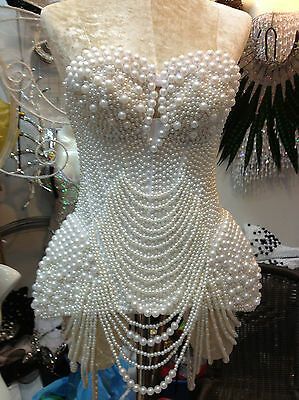 a dress made out of pearls and beads