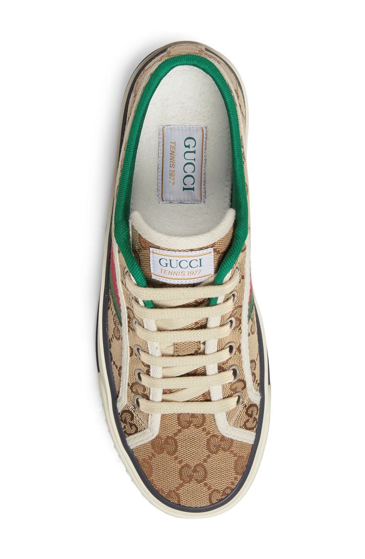 Gucci serves up some heritage style with a low-top sneaker branded with Web striping, double-G sole embossing and retro sport labels at the tongue and footbed. Style Name:Gucci Tennis 1977 Platform Sneaker (Women). Style Number: 6002528. Gucci Low-top Sneakers With Logo, Gucci Low-top Sporty Sneakers, Gucci Sporty Low-top Sneakers, Gucci High-top Logo Sneakers, Gucci High-top Sneakers With Logo, Gucci High-top Sneakers With Rubber Sole, Gucci Sneakers With Logo And Round Toe, Sporty Gucci Sneakers With Logo Print, Gucci High-top Sneakers With Logo Print