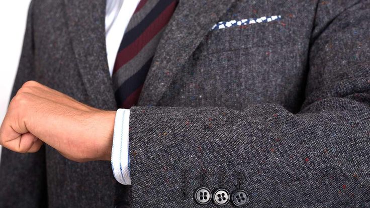 In need of a sophisticated look to dress up your winter wardrobe? This Dark Grey Donegal Tweed Suit with its traditional colour flecking makes for a comfortable, classy and professional-looking way to tackle the cold weather. 	
Leave it to the Italians to update a British classic - the 100% merino wool fabric woven by Lane Bottoli is truly the best of both worlds. The durability, drape and stunning texture of old-school British tweed are polished up with the smoother and softer hand and lightnes Tweed Suits For Winter Semi-formal Occasions, Winter Tweed Semi-formal Suit, Tweed Jacket For Formal Winter Occasions, Semi-formal Fall Herringbone Suit, Timeless Business Casual Tweed Jacket With Suit Collar, Business Tweed Jacket With Notch Lapel And Button Cuffs, Winter Office Tweed Jacket With Button Cuffs, Luxury Winter Tweed Jacket With Button Cuffs, Elegant Winter Tweed Jacket With Button Cuffs