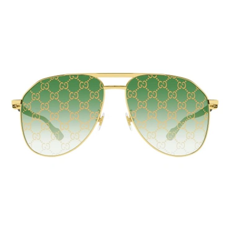 Introducing the luxurious Gucci GG1220S 004 Gold/Green with Pattern sunglasses, a must-have accessory for the modern man with an eye for high fashion. Crafted from the finest metal materials, these Aviator-style frames exude sophistication and style. The striking gold frame effortlessly complements the vibrant green lenses with a unique pattern, creating a bold and statement-making look. The oversized lens socket width of 59 and the bridge size of 14 ensure a comfortable and secure fit for all-day wear. Designed with precision and attention to detail, these Gucci sunglasses feature the iconic Gucci logo on the temples, showcasing the brand's heritage and status as a leader in luxury fashion. The temple length of 145 adds a touch of elegance to the overall design, making these sunglasses an Designer Aviator Sunglasses With Mirrored Lenses, Designer Gold Aviator Sunglasses With Uv Protection, Elegant Green Gucci Sunglasses, Luxury Aviator Sunglasses With Uv Protection, Luxury Green Gucci Sunglasses, Luxury Green Sunglasses With Mirrored Lenses, Gucci Designer Aviator Sunglasses With Tinted Lenses, Gucci Luxury Sunglasses With Gradient Lenses, Luxury Gucci Sunglasses With Gradient Lenses