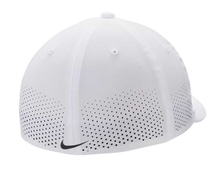 the nike cap is white and has black dots on it