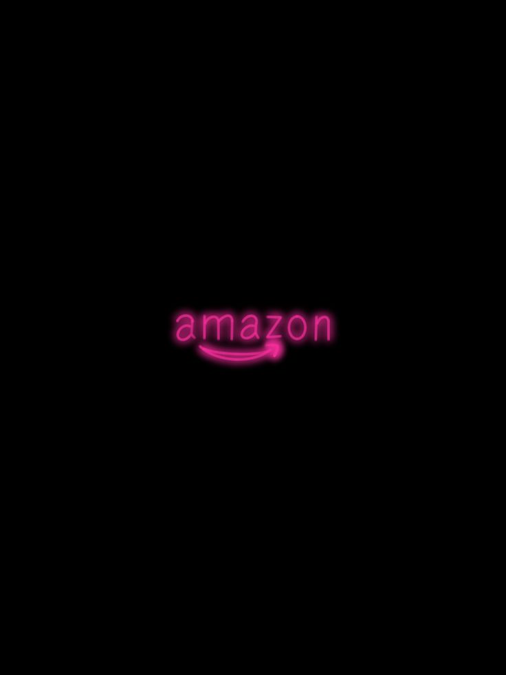 the amazon logo is lit up in pink on a black background with text that reads,'amazon '