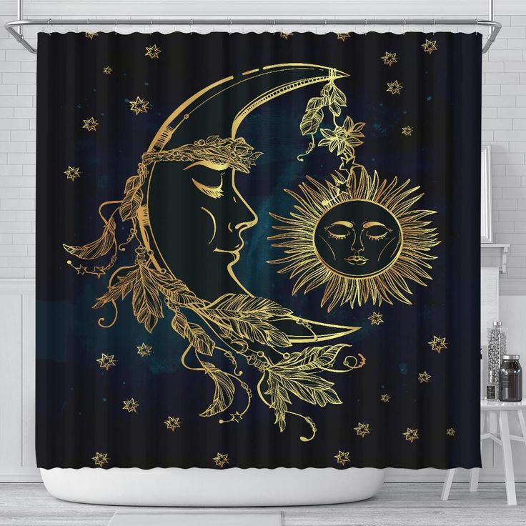 a shower curtain with an image of the moon and sun in gold on a black background