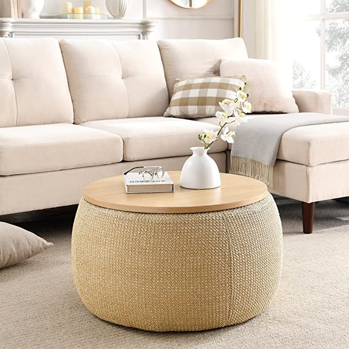 a living room filled with furniture and a white couch