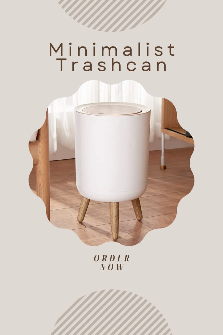 the minimalist trashcan is sitting on a wooden table