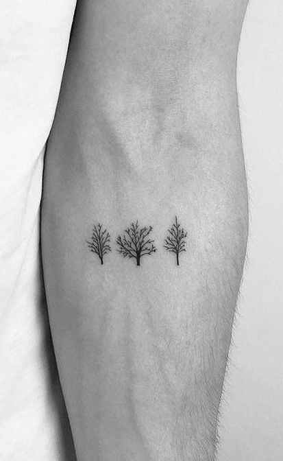 three small trees tattoo on the leg