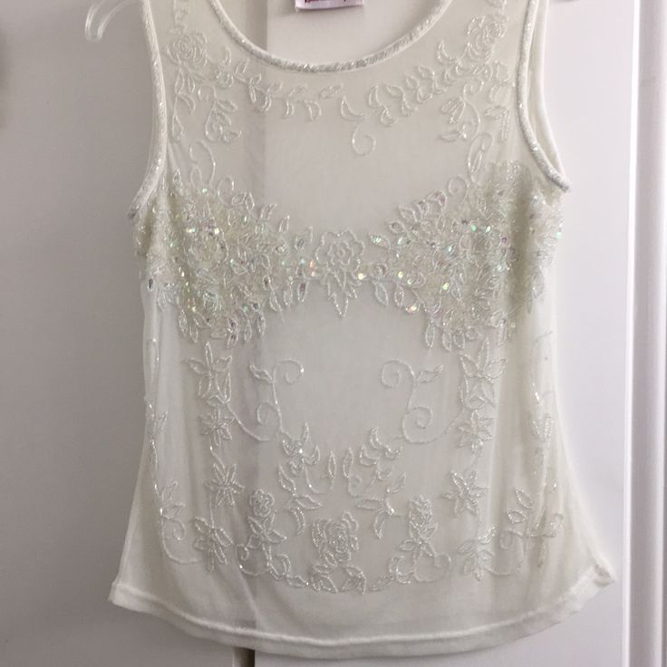 Cream-Colored Sheer Top With Gorgeous Beading. Took Pictures Of All Parts So You Can See All Beads Are There! Stunning! Can Put Any Color Tank Or Bra Under Or Go Super-Sexy And Sheer! Elegant Beaded Tops For Party, Elegant Beaded Tops For Wedding, Glamorous Beaded Tops For Wedding, White Beaded Top For Party, Elegant Fitted Top With Beaded Straps, White Embellished Top For Party, White Embellished Party Top, Elegant Party Tops With Beaded Straps, White Beaded Party Top