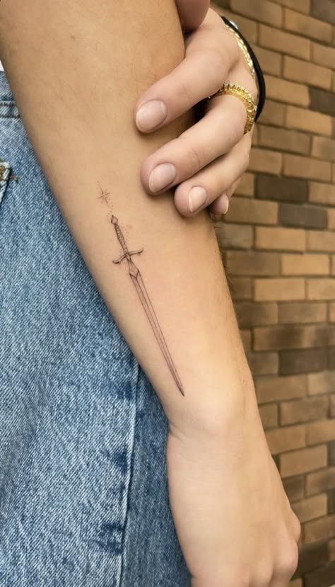 Cool First Tattoos, Unknown Tattoo, Tattoo Celestial, Lotr Tattoo, Bookish Tattoos, Dagger Tattoo, Discreet Tattoos, Book Tattoo, Spine Tattoos