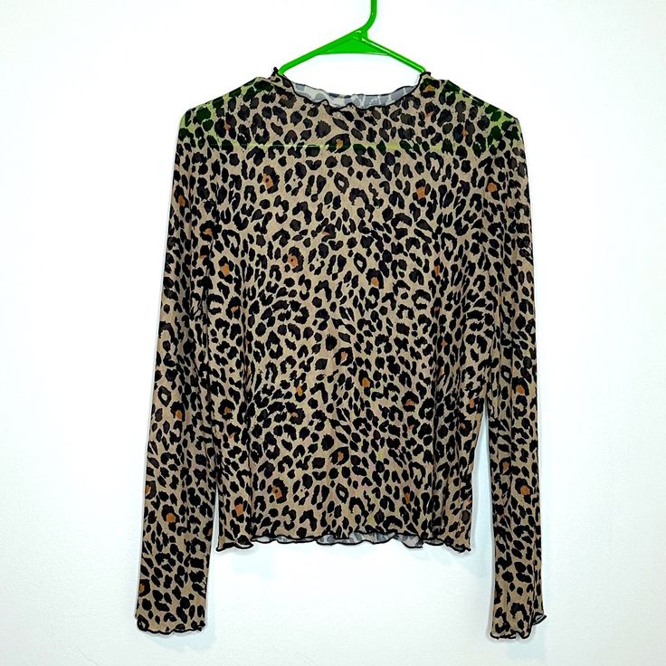 Nwt Zara Cheetah Print Mesh See Through Long Sleeve Top In Excellent Used Like New Conditions. No Flaws! Size Medium Cheetah Print Approx Measurements Pit To Pit 17” Length 23” Please Keep In Mind That There May Be A Slight Color Difference Between The Product And The Pictures Due To Different Monitor Calibrations And Lighting. Thanks For Stopping By, I Appreciate It ! Same Day / Next Day Shipping, Offers Welcome, From A Smoke & Pet Free Home Leopard Print Stretch Tops For Spring, Spring Leopard Print Stretch Blouse, Spring Leopard Print Stretch Top, Leopard Print Stretch Blouse For Spring, Stretch Leopard Print Blouse, Spring Stretch Leopard Print Tops, Stretch Leopard Print Blouse For Spring, Fitted Tiger Print Top For Fall, Casual Long Sleeve Tiger Print Tops