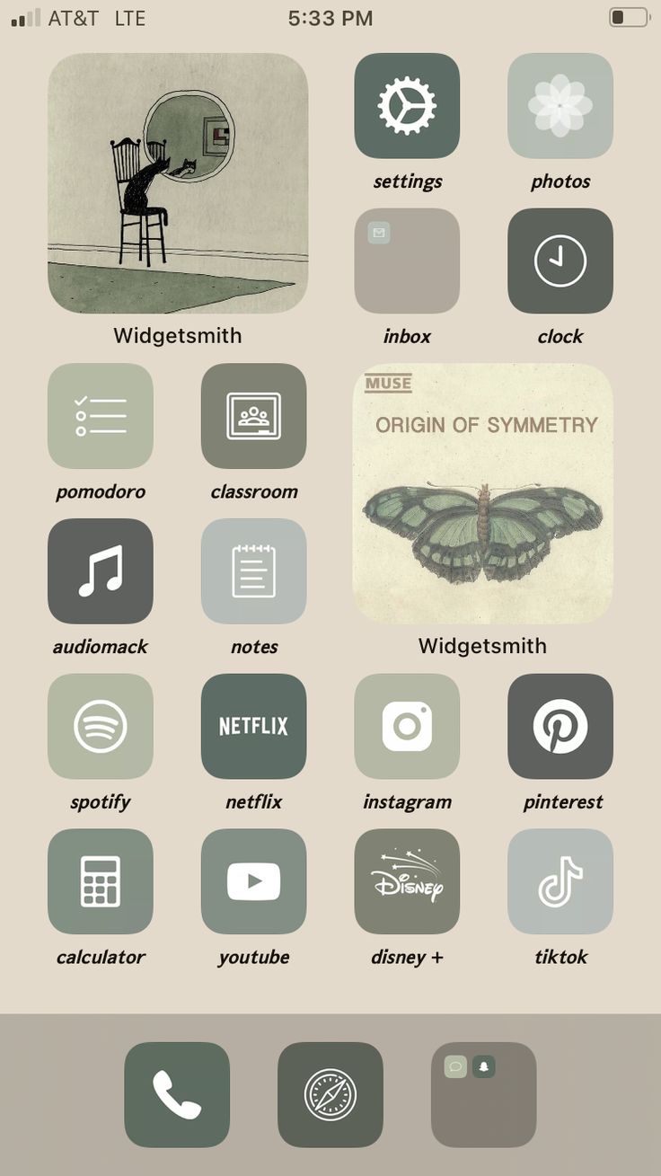 an iphone screen with various icons and symbols on the bottom right corner, including a butterfly sitting on a chair