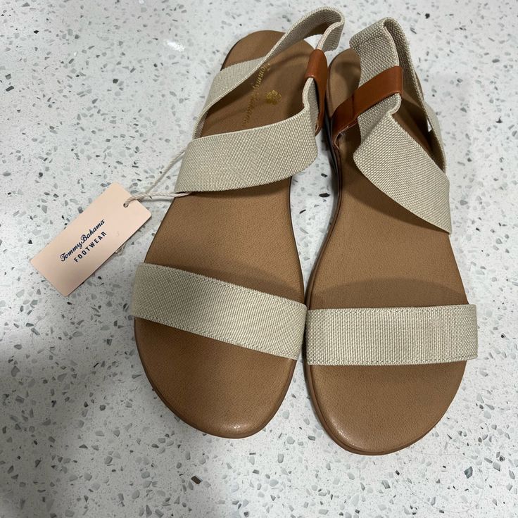 Brand New, With Tags. Tommy Bahama Women’s Briana Sandals. Stretchy Straps That Shape To Your Feet. Extremely Comfortable. Size 8.5 Vacation Sandals With Ankle Strap Medium Width, Beach Footbed Sandals With Heel Strap And Round Toe, Beach Footbed Sandals With Heel Strap, Medium Width Ankle Strap Sandals For Vacation, Comfortable Beige Sandals For Day Out, Casual Sandals With Textured Footbed Medium Width, Beige Flat Heel Slingback Sandals For Vacation, Medium Width Cushioned Slingback Sandals For The Beach, Adjustable Heel Strap Footbed Sandals For Beach