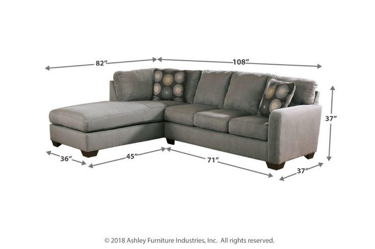 a sectional couch with pillows and measurements for the back section, including the foot rest