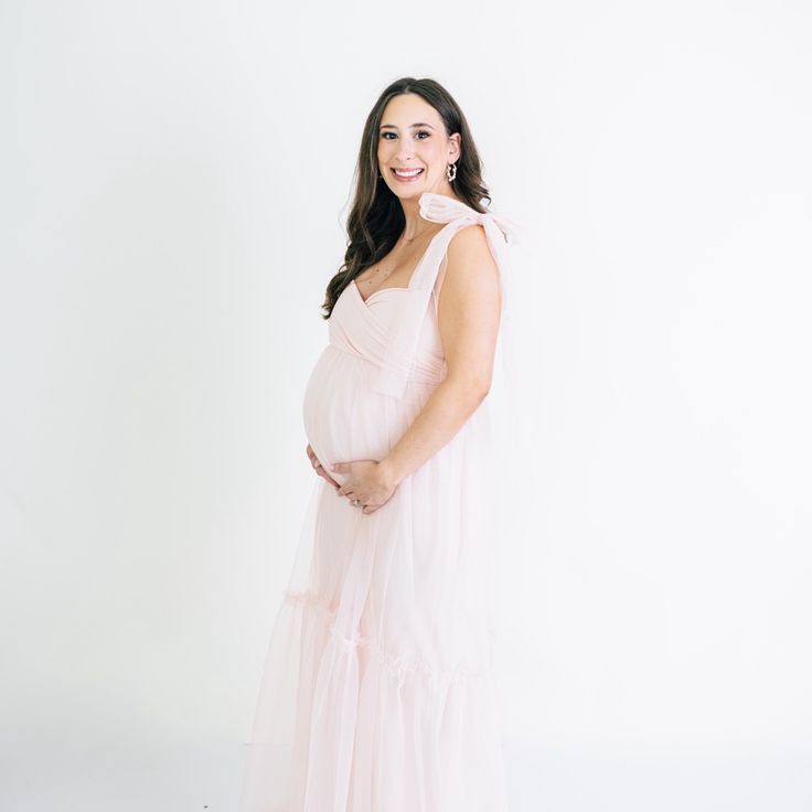 Maternity Photo Gown Size Xxs. I Am Currently 140lbs And 5’1in 34dd And Still Had A Lot Of Room. Fitted Dress Underneath Tool Is Stretchy. Elegant Sleeveless Maternity Bridesmaid Dress, Elegant Sleeveless Maternity Dress For Wedding, Sleeveless Pink Maternity Dress For Wedding, Pink Sleeveless Maternity Dress For Wedding, Feminine Sleeveless Gown With Fitted Bodice, Elegant Maternity Gown With Fitted Bodice, Elegant Fitted Tulle Maternity Dress, Elegant Bridesmaid Maternity Dress In Tulle, Elegant Tulle Maternity Bridesmaid Dress