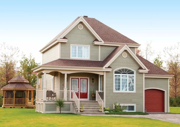 a house with a gazebo in the front yard