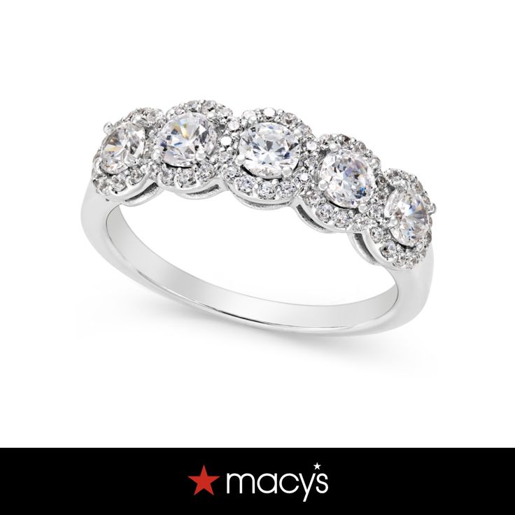 a white gold ring with five stones on the side and an inscription that says macy's