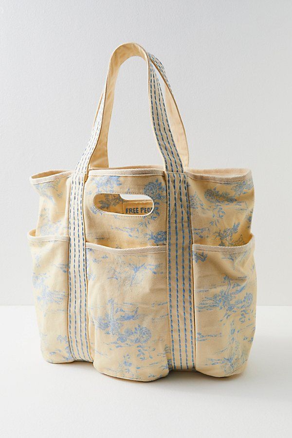 Just as effortless as it is essential, this head-turning tote bag is featured in an oversized, square silhouette with desert-inspired printing throughout and defined pocket detailing for added functionality. **Features:** Oversized style, square silhouette, defined pocket detailing, double handle feature **Why We ❤ It:** Designed to take you from a picnic, to the shore, or to the store, this wear-anywhere tote is sure to be your go-to bag no matter the occasion. | Printed Caravan Tote Bag by FP College Tote, School Tote, Oversized Style, Pretty Bags, Cute Bags, Arm Candy, Pocket Detail, Things To Buy, Caravan