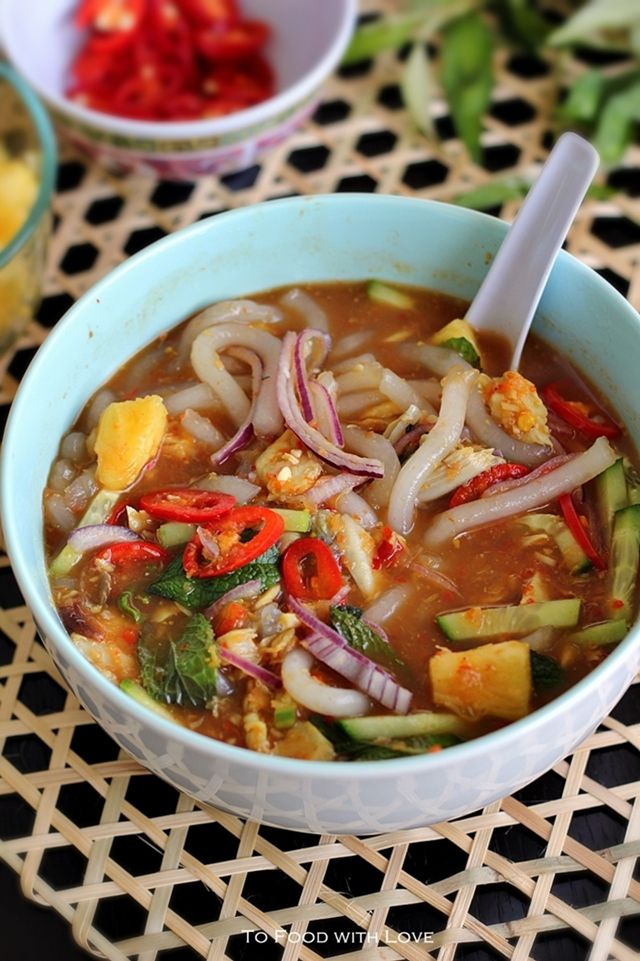 a bowl of soup with noodles and vegetables