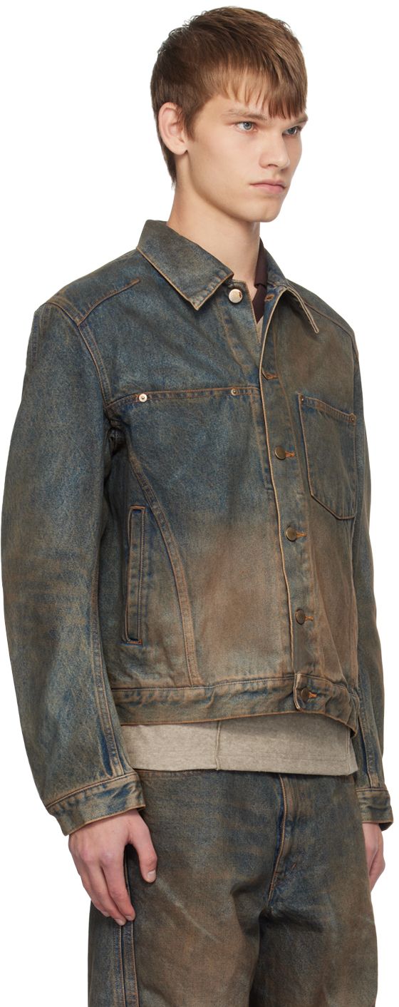 Non-stretch denim jacket. Fading and smudging throughout. · Spread collar · Button closure · Patch pocket and welt pockets · Single-button barrel cuffs · Adjustable button tabs at back hem · Unlined Supplier color: Mud faded indigo Faded Washed Button-up Outerwear, Classic Washed Outerwear With Vintage Look, Classic Faded Washed Outerwear, Classic Washed Faded Outerwear, Classic Faded Washed Denim Jacket, Faded Washed Button-up Denim Jacket, Faded Washed Denim Button-up Jacket, Faded Button-up Denim Jacket, Rugged Faded Outerwear With Pockets