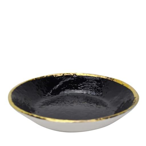 a black and white bowl with gold rim