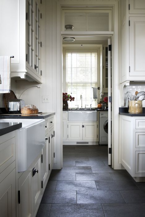 the kitchen is clean and ready for us to use it's tile flooring