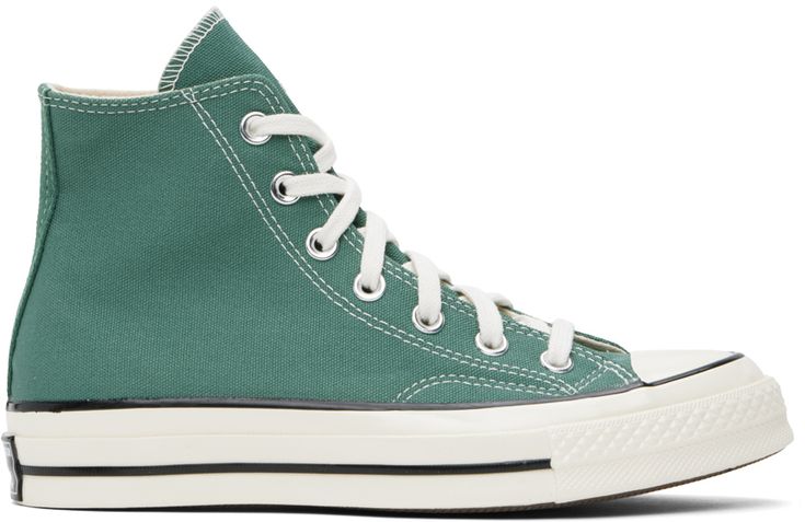 High-top canvas sneakers in green. · Rubber cap toe · Lace-up closure · Logo patch and eyelets at inner side · Cushioned Ortholite® footbed · Canvas lining · Rubberized logo patch at midsole · Treaded rubber sole · Contrast stitching in white Supplier color: Admiral elm/Egret/Black Green High-top Sneakers With Logo Patch, Casual Green High-top Sneakers With Logo Patch, Green High-top Canvas Shoes With Rubber Sole, Green Cotton Sneakers With Gum Sole, Green Cotton Sneakers With Vulcanized Sole, Green Cotton Sneakers With Rubber Sole, Green Sneakers With Embroidered Logo And Round Toe, Green Round Toe Sneakers With Embroidered Logo, Sporty Green High-top Cotton Sneakers