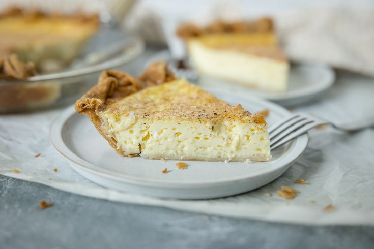 a piece of pie sitting on top of a white plate