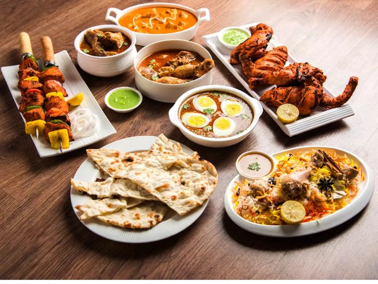 a table topped with lots of different types of food