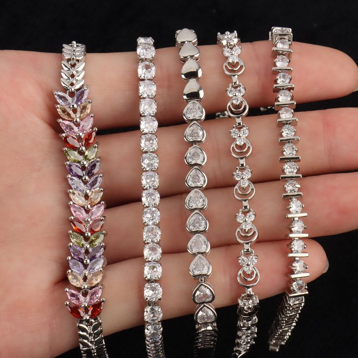 These Lucky Charm Bracelets are exquisitely crafted from 24K white gold plated for a luxuriously polished look. With ultra-sparkling crystals, these bracelets are sure to add a touch of elegance to any look. They make the perfect gift for any occasion, especially Mother's Day.