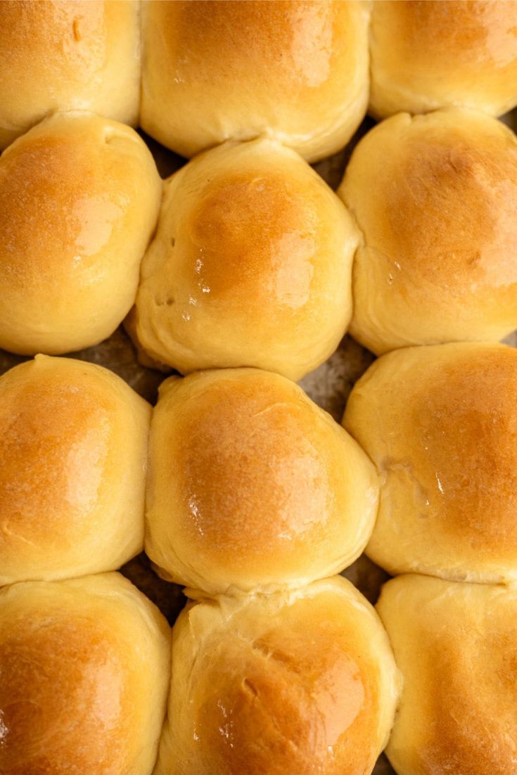 several rolls sitting on top of each other in a pan