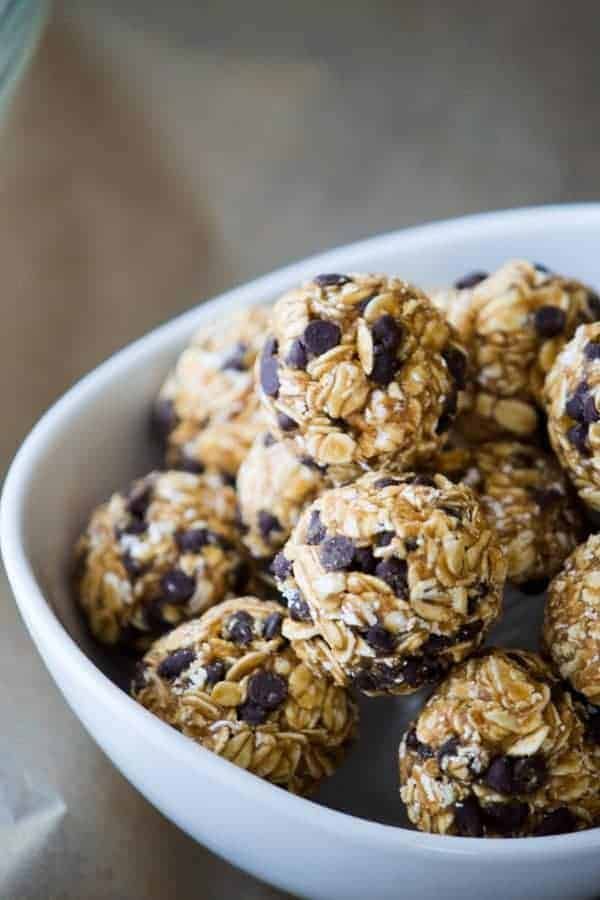 a white bowl filled with chocolate chip energy bites