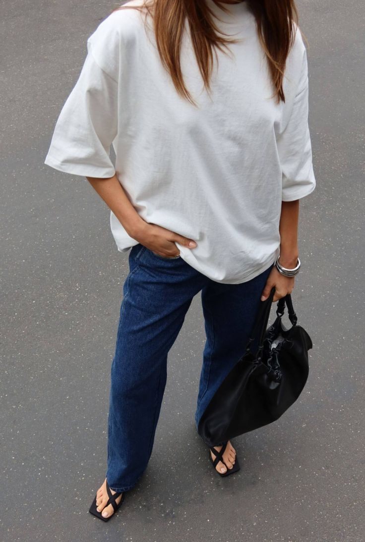 The Alex Tee by Nakedvice is a white high neck boxy style t-shirt. Designed for comfort the Alex Tee is the perfect essential tee to add to your capsule wardrobe. 

Montana is wearing a size S and is 179cm tall. 
Laura is wearing a size S and is 177cm tall. 
 Size: XS, S, M, L, XL; Colour: WHITE Oversized T-shirt For Spring Workwear, Versatile Oversized T-shirt For Everyday, Chic Oversized T-shirt, Versatile White Cotton T-shirt, Versatile Crew Neck T-shirt For Day Out, Versatile Oversized T-shirt, White Versatile T-shirt For Summer, Versatile White T-shirt For Summer, White Boxy T-shirt For Summer