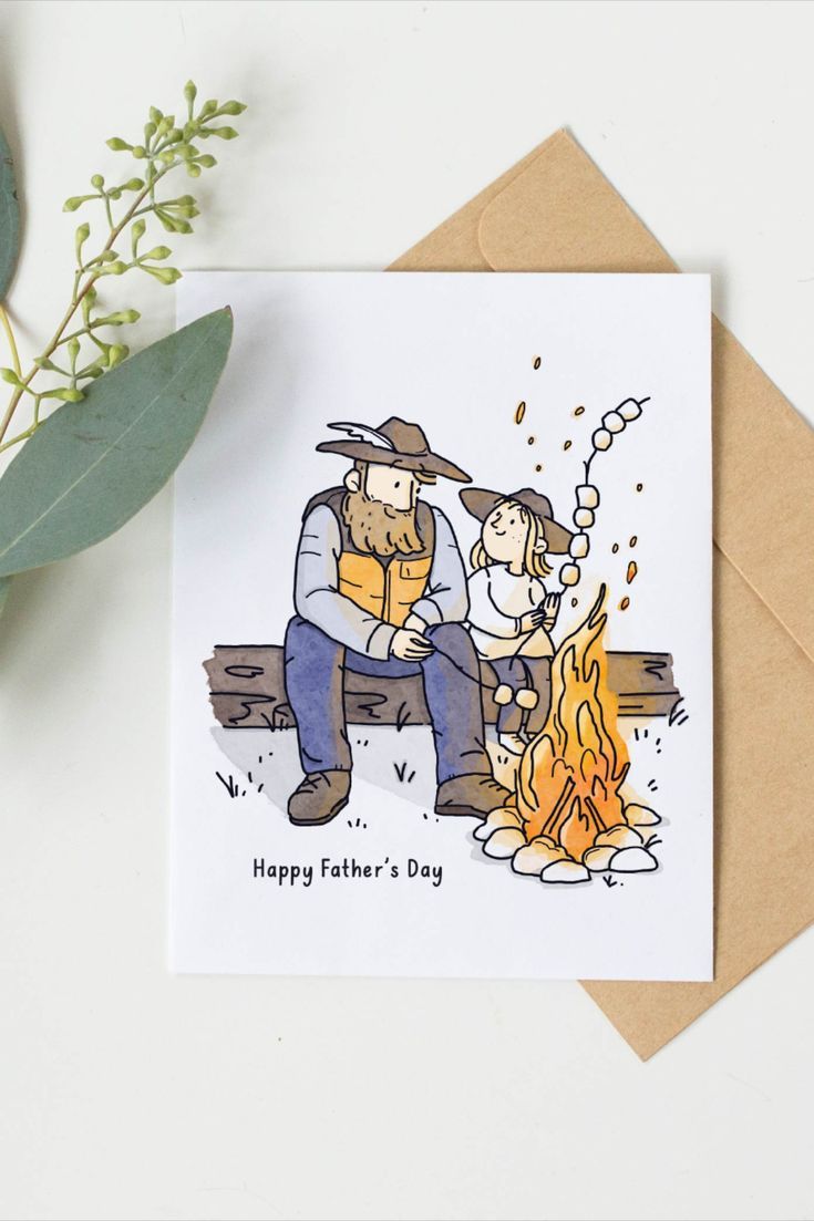 a father's day card with an image of a man sitting on a bench next to a campfire