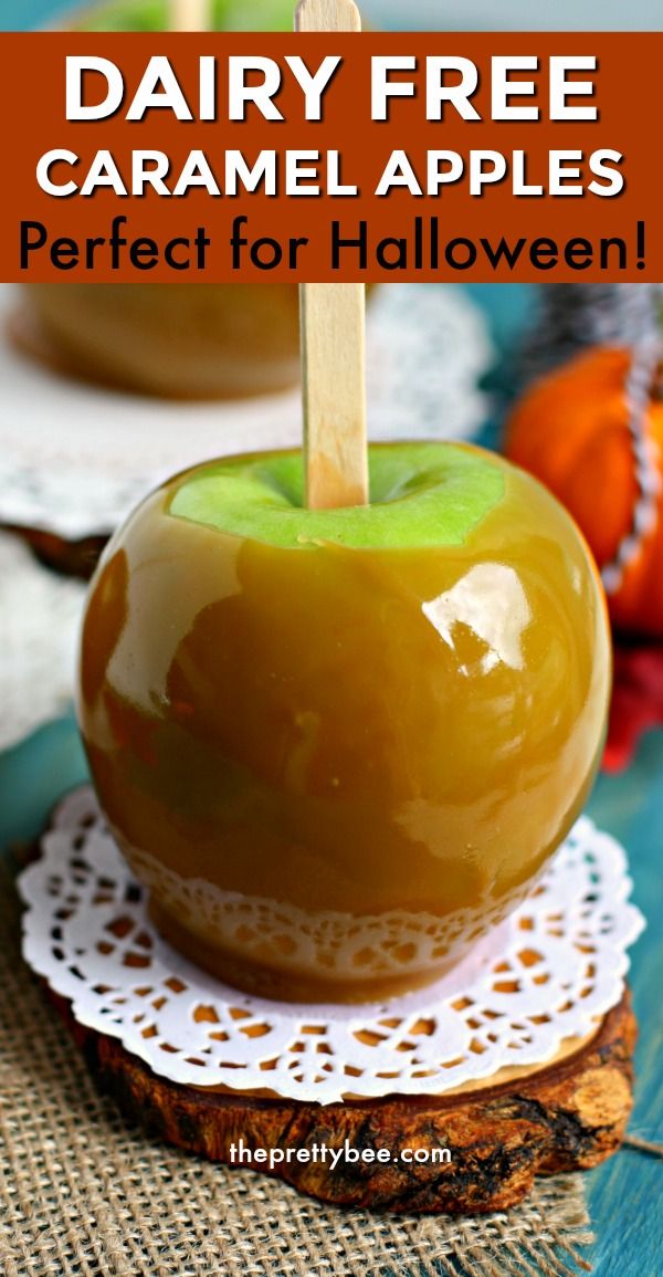 an apple sitting on top of a piece of wood with the words, dairy free caramel apples perfect for halloween