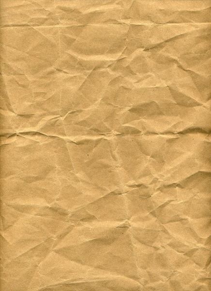 a piece of brown paper that has been wrinkled with some sort of crinkle on it