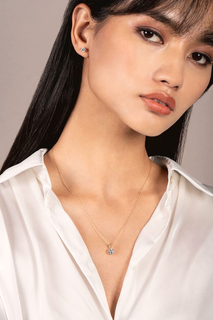 This classic pendant showcases an exquisite 1.0 carat Round cut Cubic Zirconia stone. Due to its brilliant and traditional design, Round cut is the most popular and sought-after stone shapes. Our CZ looks just like a real diamond that would cost thousands of dollars. Professionally mounted in a heavy basket setting, this alluring pendant dangles from a 16-inch box link chain with a springring clasp. All are crafted in solid 14K Yellow Gold, with no other metals mixed. Your necklace will arrive e Formal Classic Birthstone Necklace With Diamond Accents, Refined Solitaire Necklace With Diamond Cut For Gifting, Refined Solitaire Diamond Cut Necklace As Gift, Refined Solitaire Necklace With Diamond Cut For Gift, Refined Lab Grown Diamond Jewelry Gift, Diamond Cut Solitaire Pendant Necklace Gift, Lab Grown Diamond Necklace With Prong Setting For Gift, Delicate Solitaire Pendant Necklace With Brilliant Cut, Delicate Solitaire Necklace With Brilliant Cut Pendant